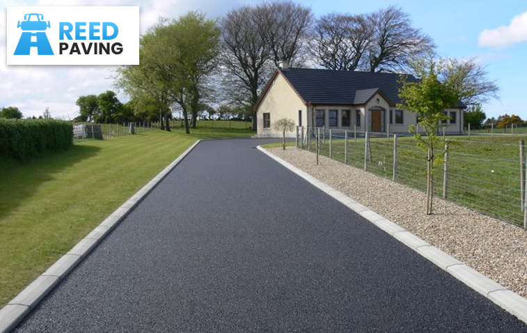 Well-maintained driveway with effective drainage at a residential home