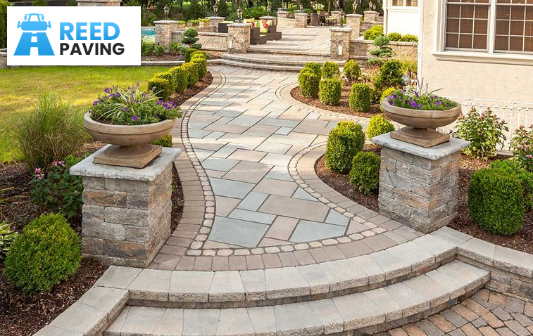 Beautiful garden yard featuring stone pathways and pavers